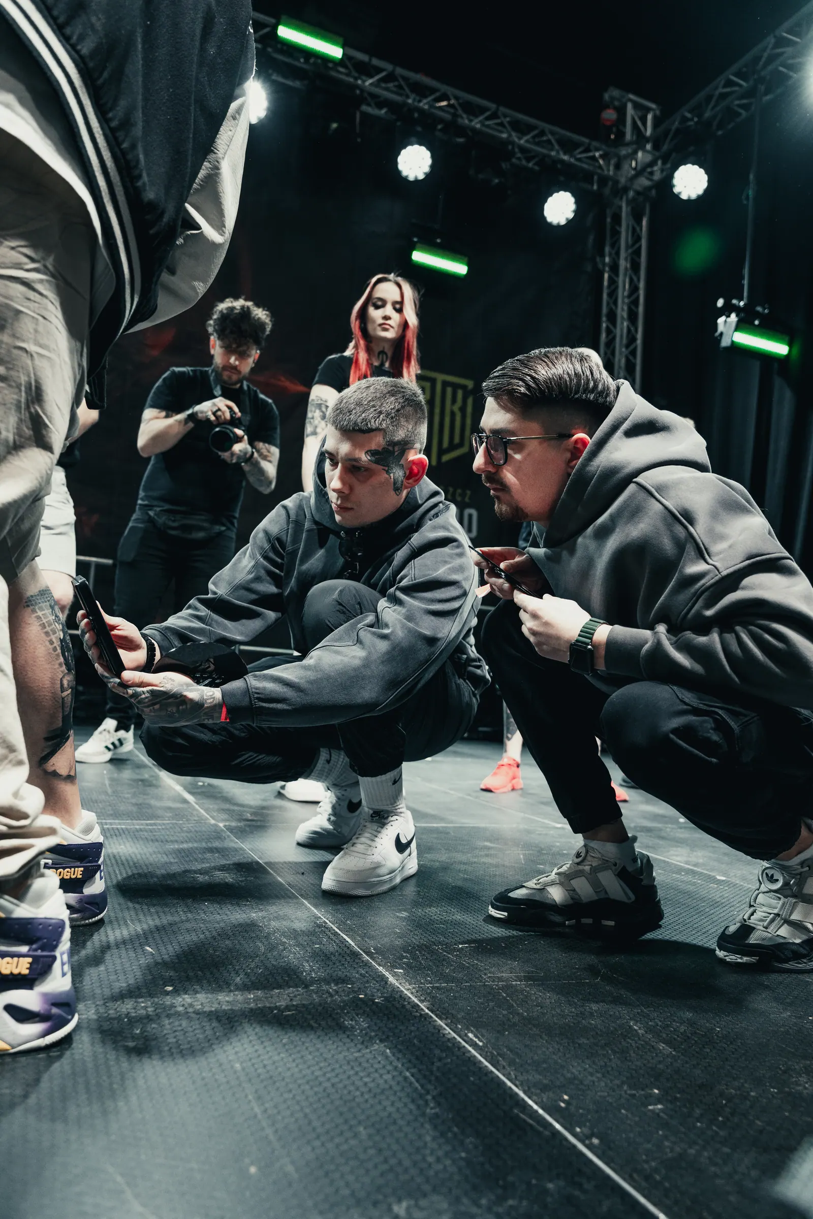 International tattoo convention judge Alex666cold evaluating realism and cover-up tattoo work